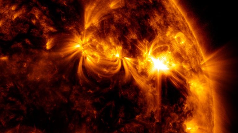 the Sun erupting with a bright solar flare