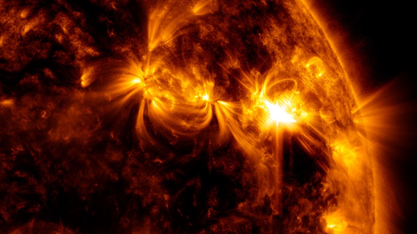 the Sun erupting with a bright solar flare